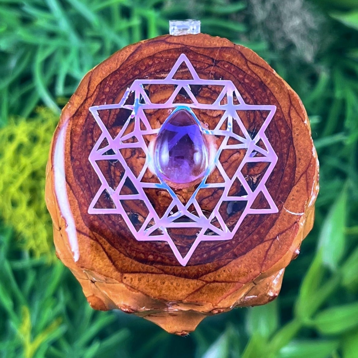 Amethyst with 64 Star Tetrahedron