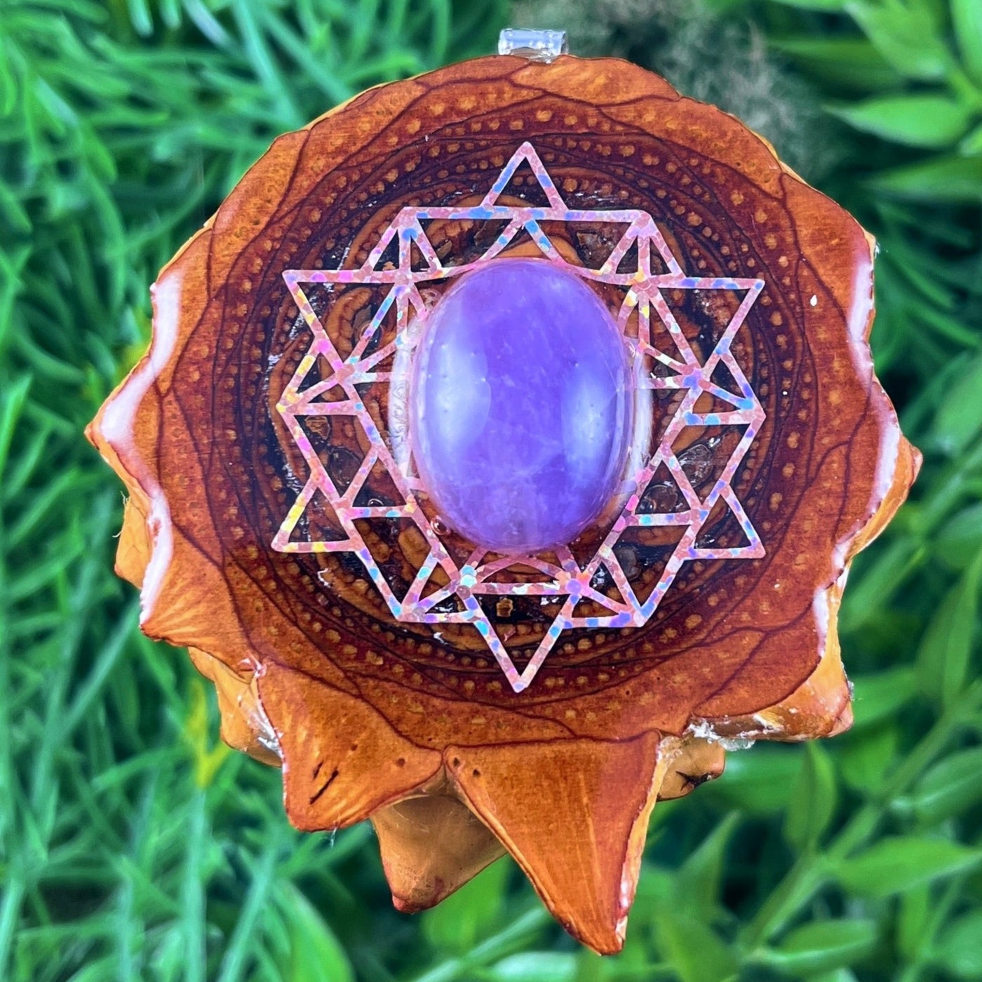 Amethyst with 64 Star Tetrahedron